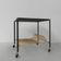 Table basse vintage sur roulettes avec porte-bagages