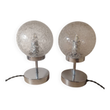 Duo of lamps in textured globe with a great play of light.