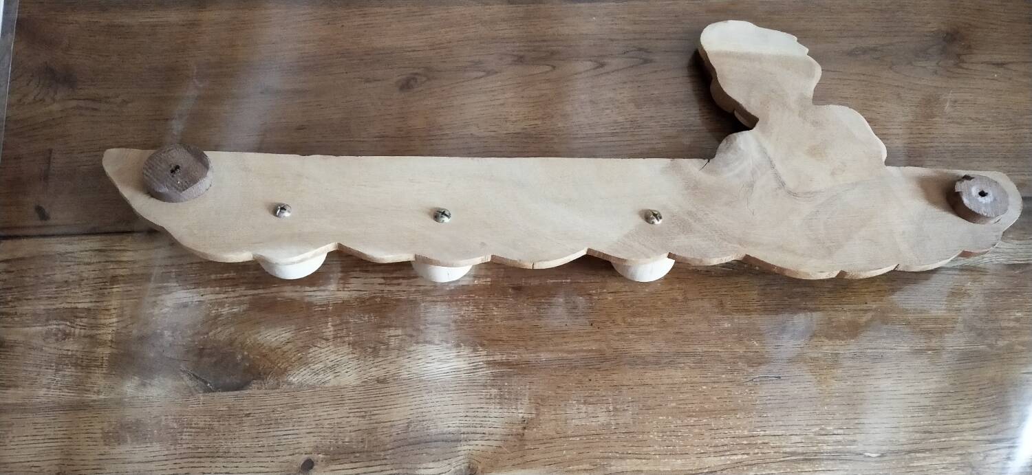 Wooden clown coat rack