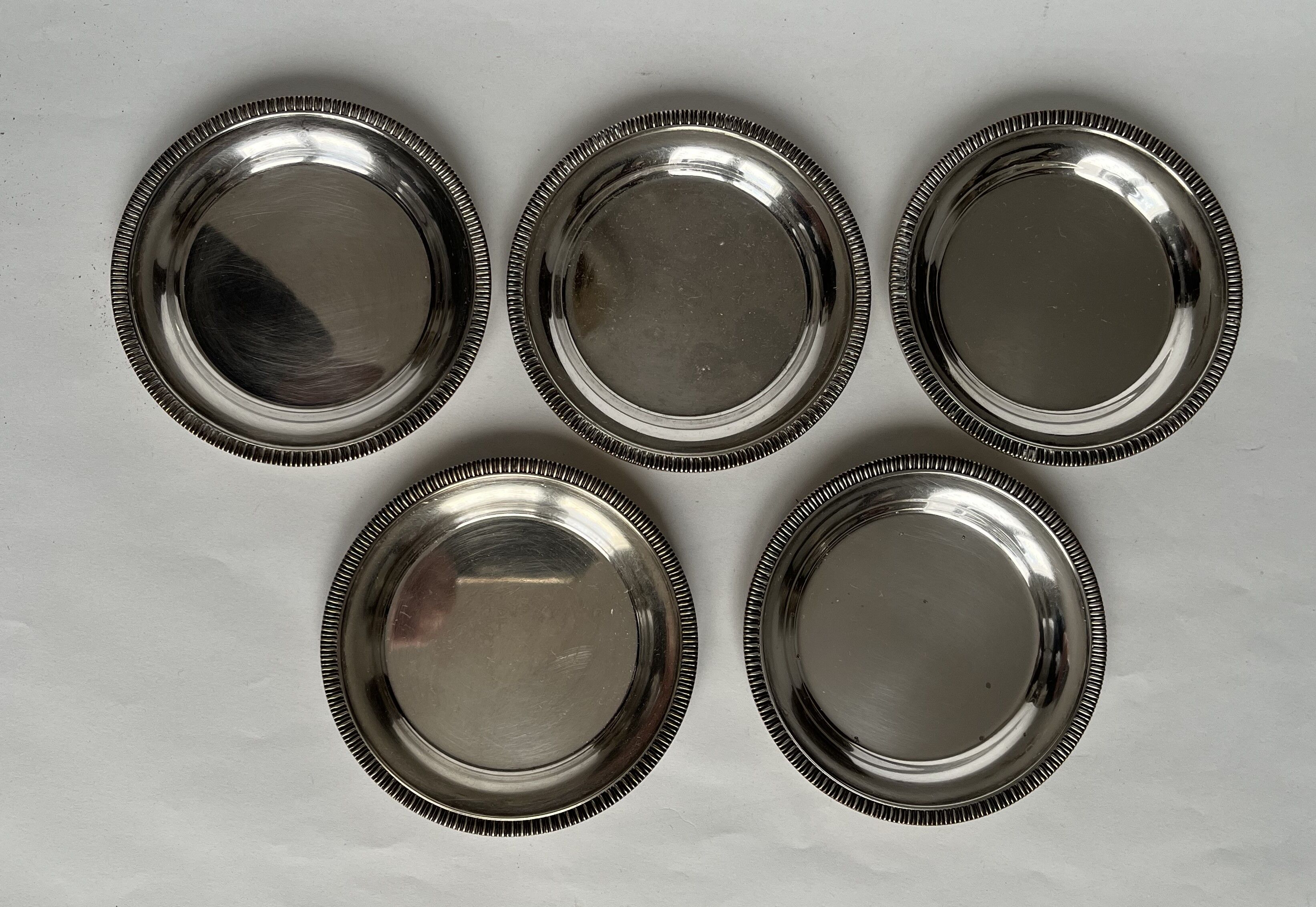 Set of 5 silvered metal coasters