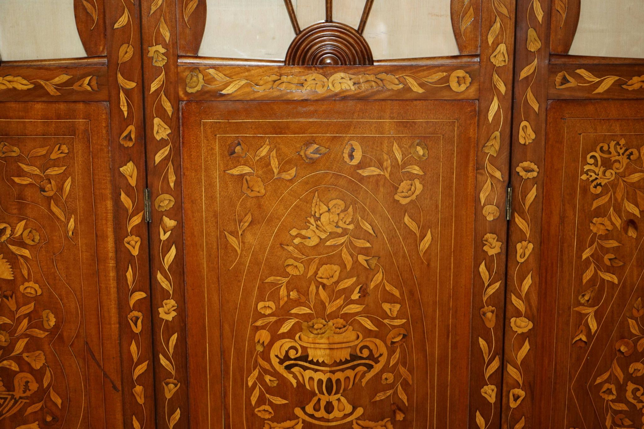 Pair of three-panel screens made of Dutch hardwood and walnut.
