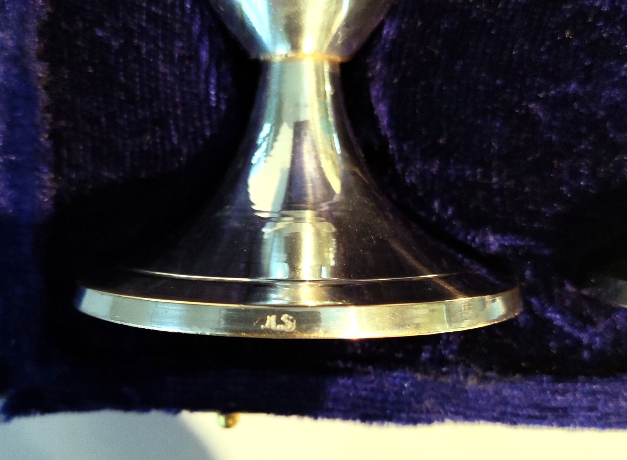 Pair of silver metal candle holders