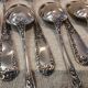 12 silver-plated metal dessert spoons, silversmith SFAM, rocaille design, 19.1 cm.