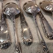 12 silver-plated metal dessert spoons, silversmith SFAM, rocaille design, 19.1 cm.