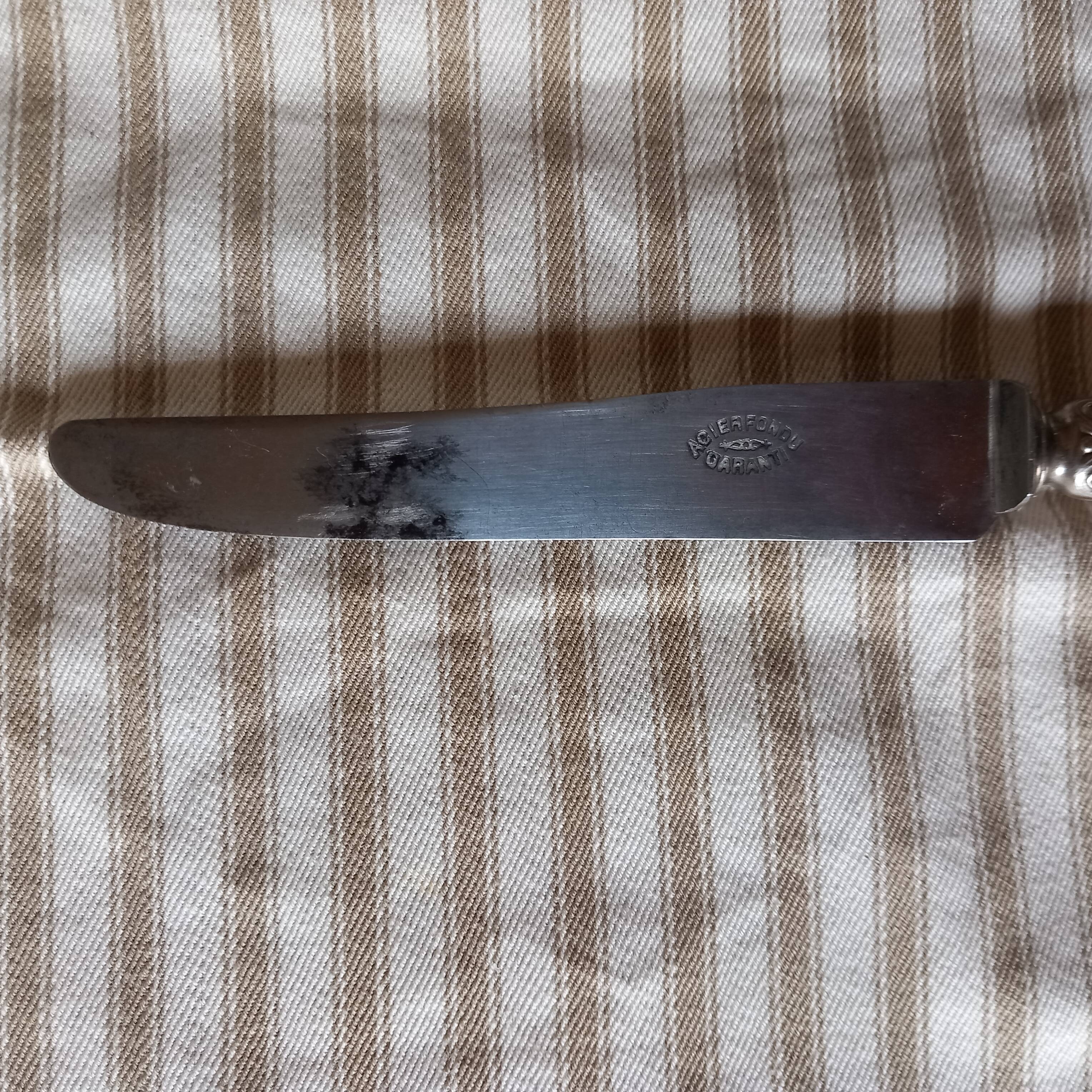 Box of 12 old cast steel knives