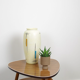 Vintage vase in light yellow porcelain