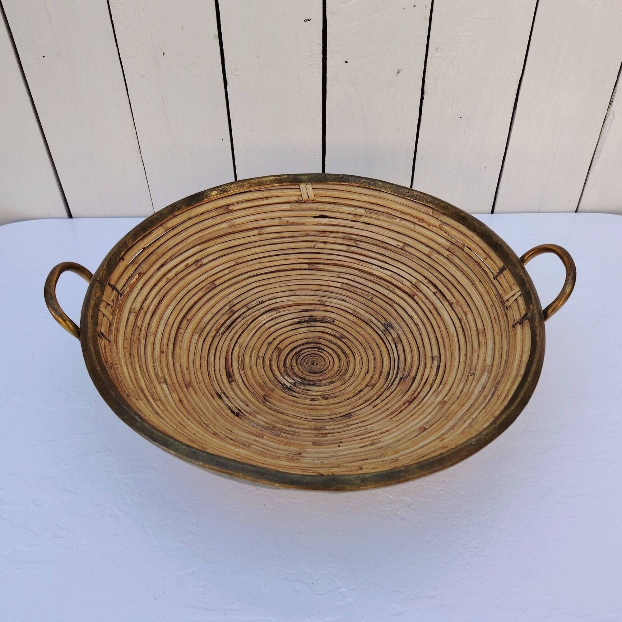 Rattan and brass basket in the style of Gabriella Crespi.