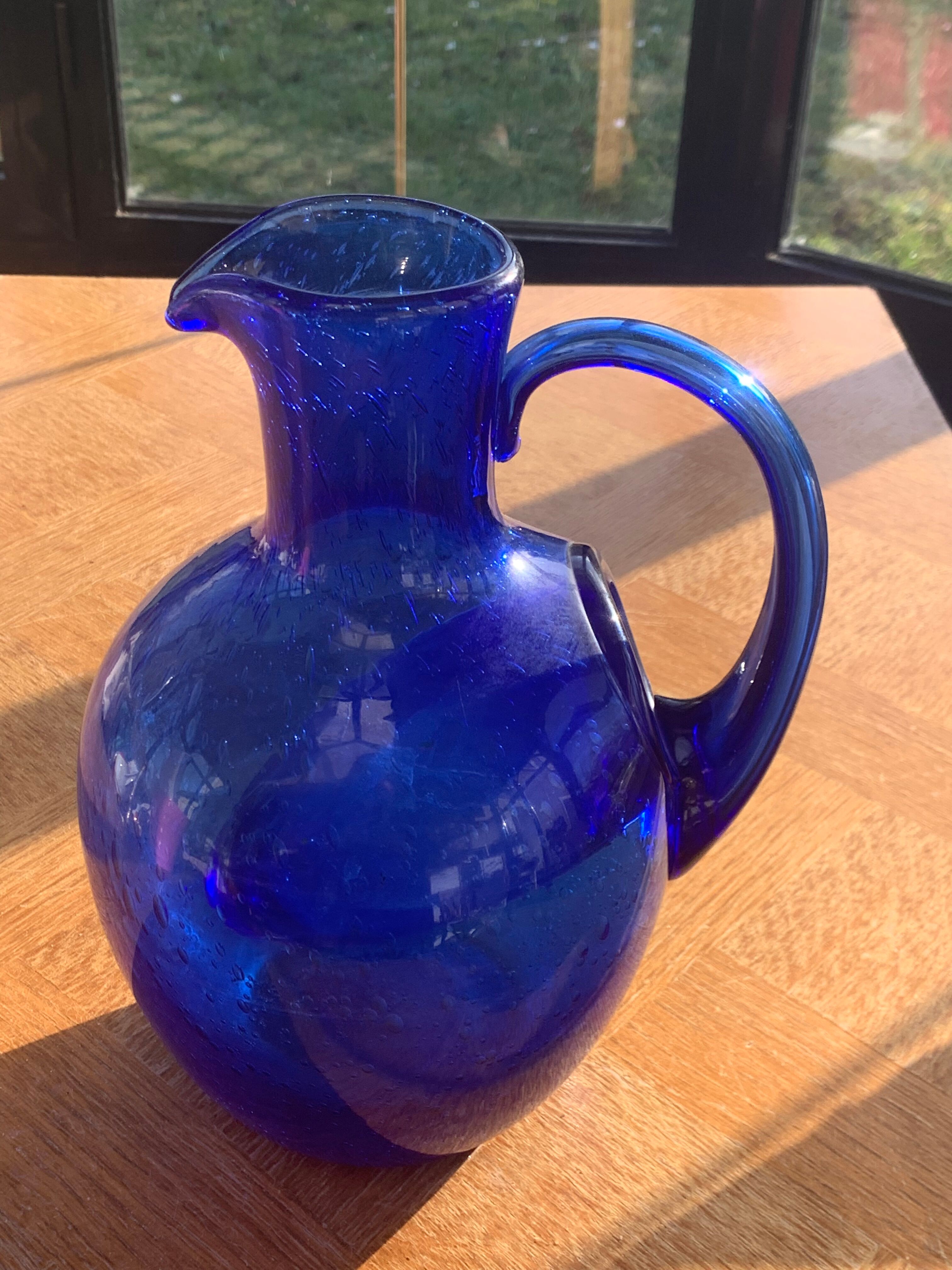 Blue blown glass ice decanter from vintage biot glassware