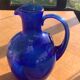 Blue blown glass ice decanter from vintage biot glassware