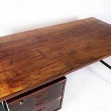Desk in rosewood and legs in metal, of Danish design from the 1960s