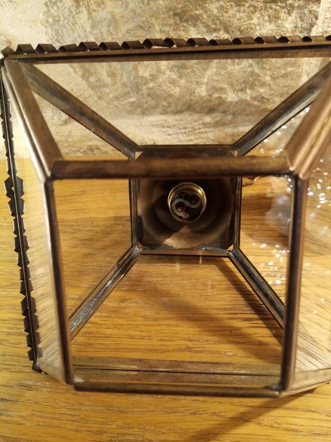 Glass and brass suspension