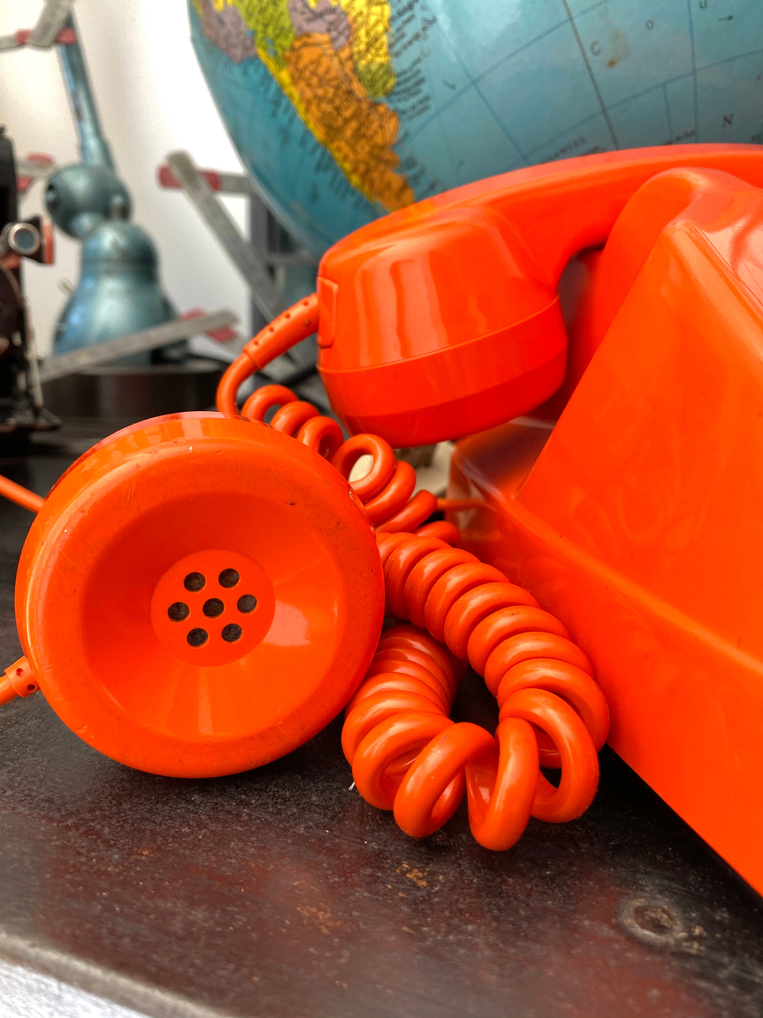 Orange vintage dial phone