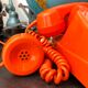Orange vintage dial phone