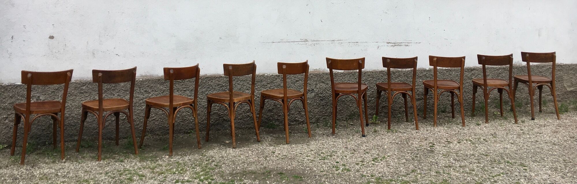 Series of 10 vintage bentwood curved wood bistro chairs