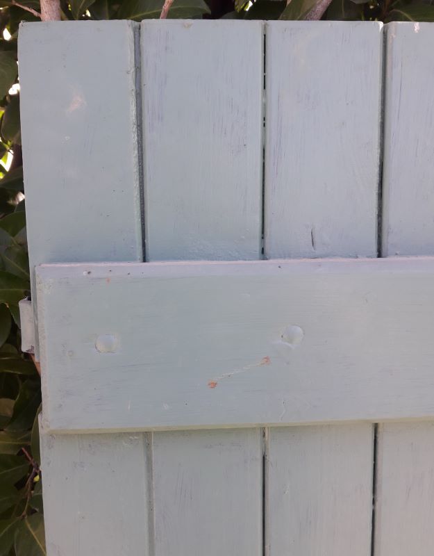 Pair of wooden iron hanging shutters