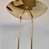 Old golden brass floor lamp with Italian design bulb from the 70s vintage
