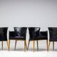Set of four Vela leather armchairs by Carlo Bartoli - Italian modern elegance.
