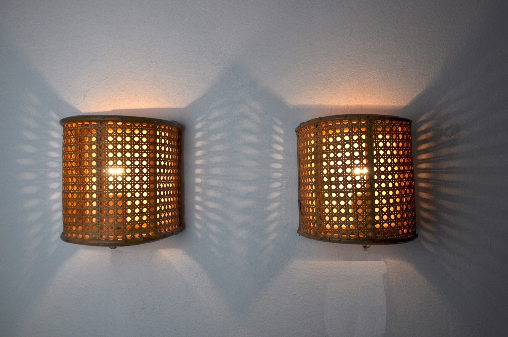 Pair of rattan wall lamps, France, 1960