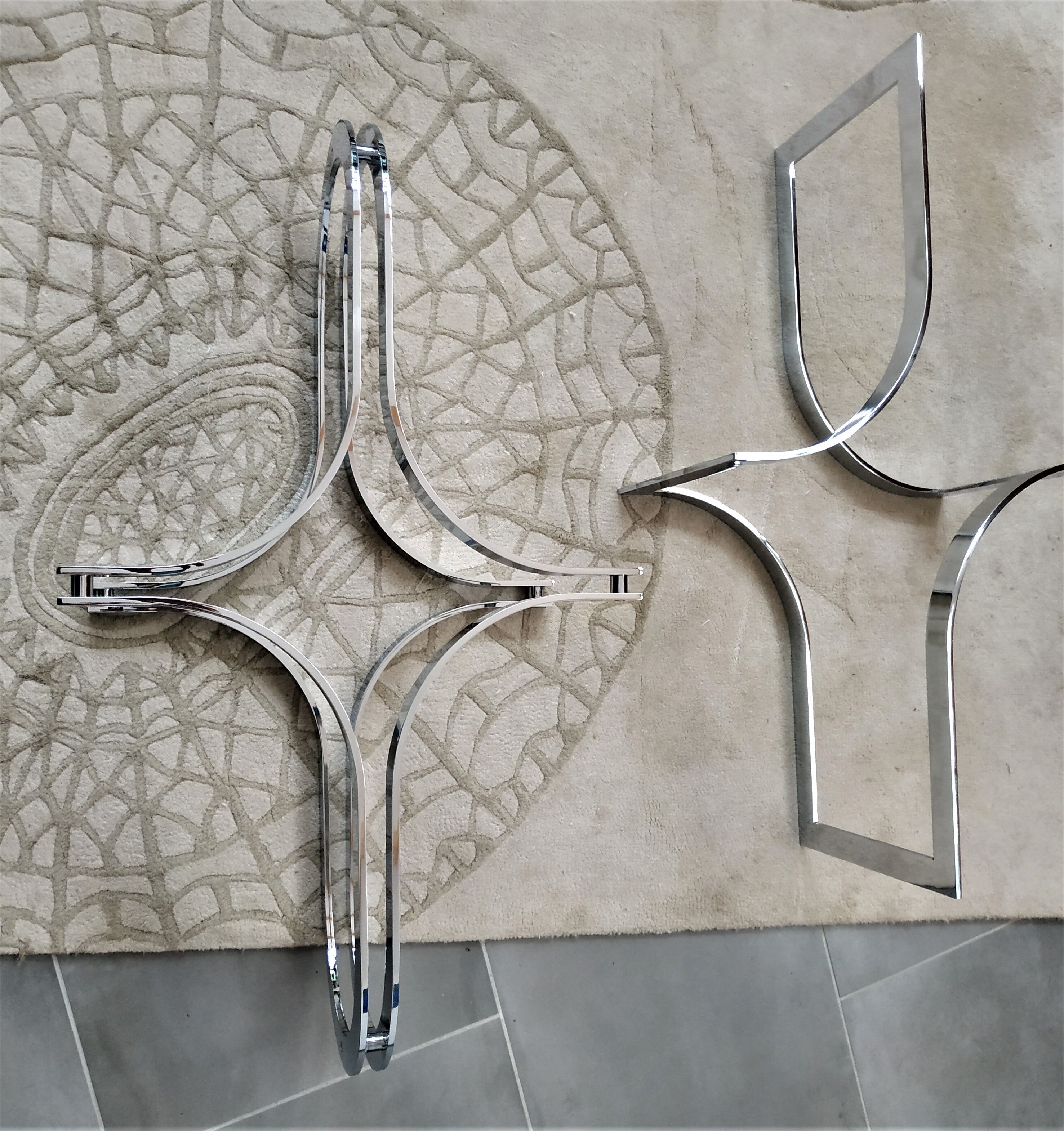 Chrome metal coffee table and oval smoked glass tray