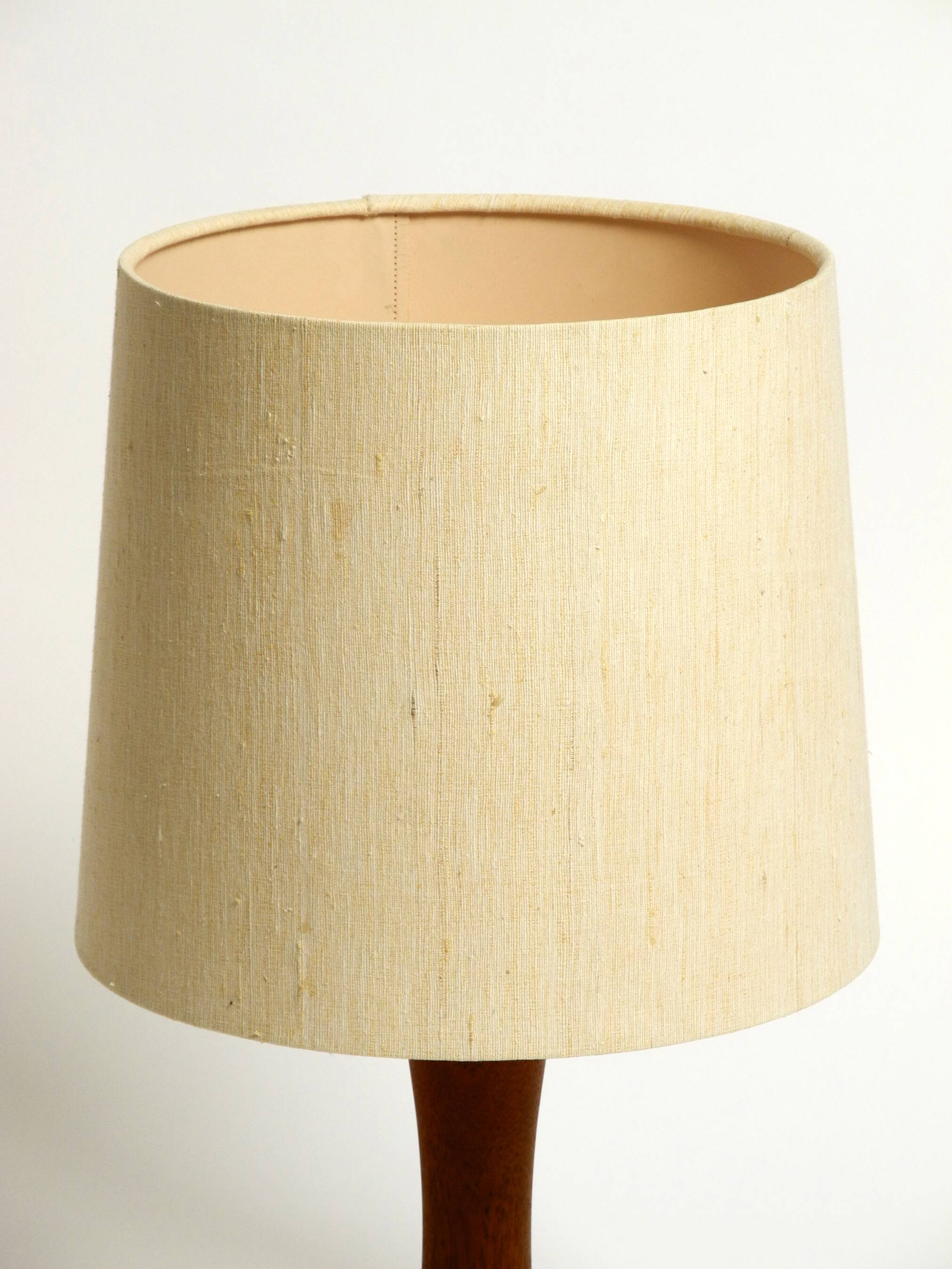 Beautiful minimalist 80s DOMUS teak table lamp with original wild silk fabr