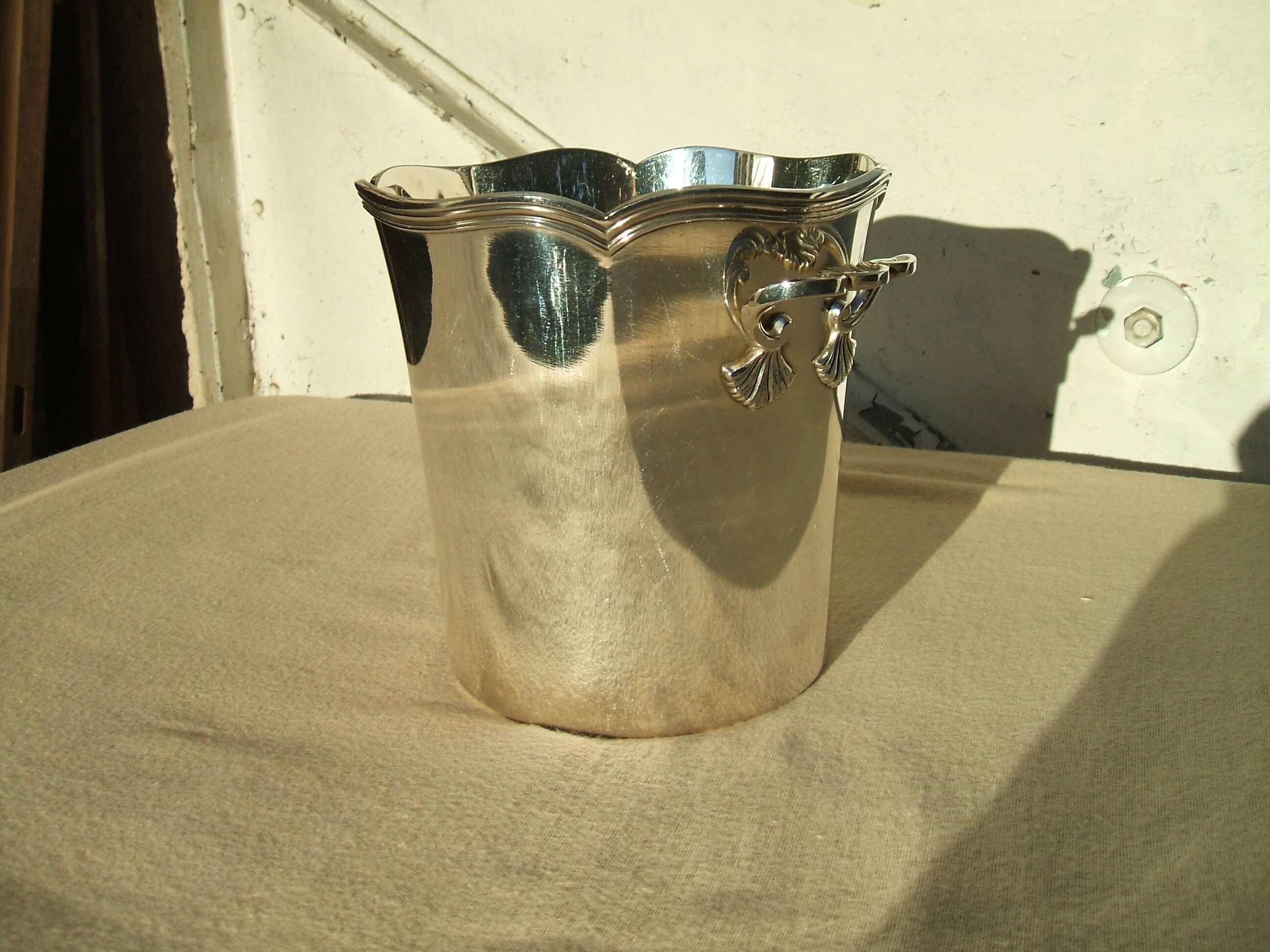 Silver metal champagne bucket