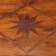 Antique Directoire table in walnut and cherry, Italy, 19th century.