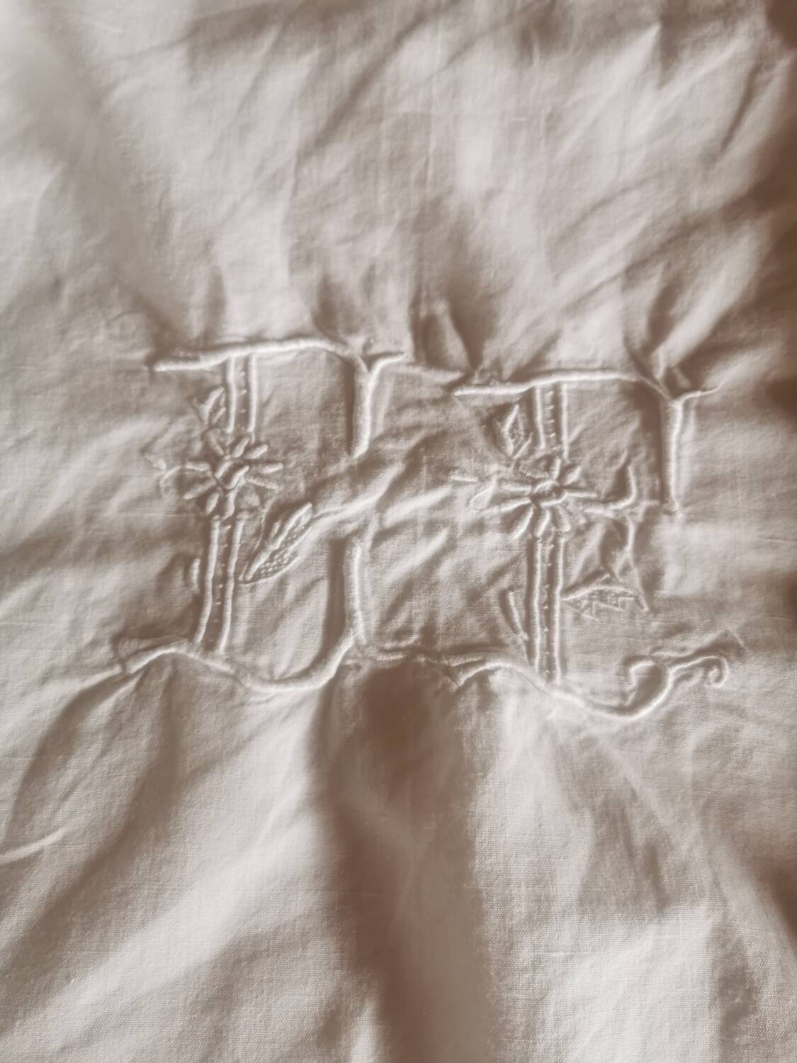 Old large monogrammed sheet hand-embroidered.