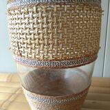 Cane glass-decorated vase and natural fibers