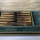 Set of 12 large knives and 11 horn and steel dessert knives