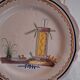 Plate dish with scalloped edges in Nevers earthenware in good condition from the 18th century.