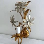Vintage Hollywood Regency gold metal leaf wall sconce.