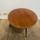 Vintage wooden coffee table with compass legs