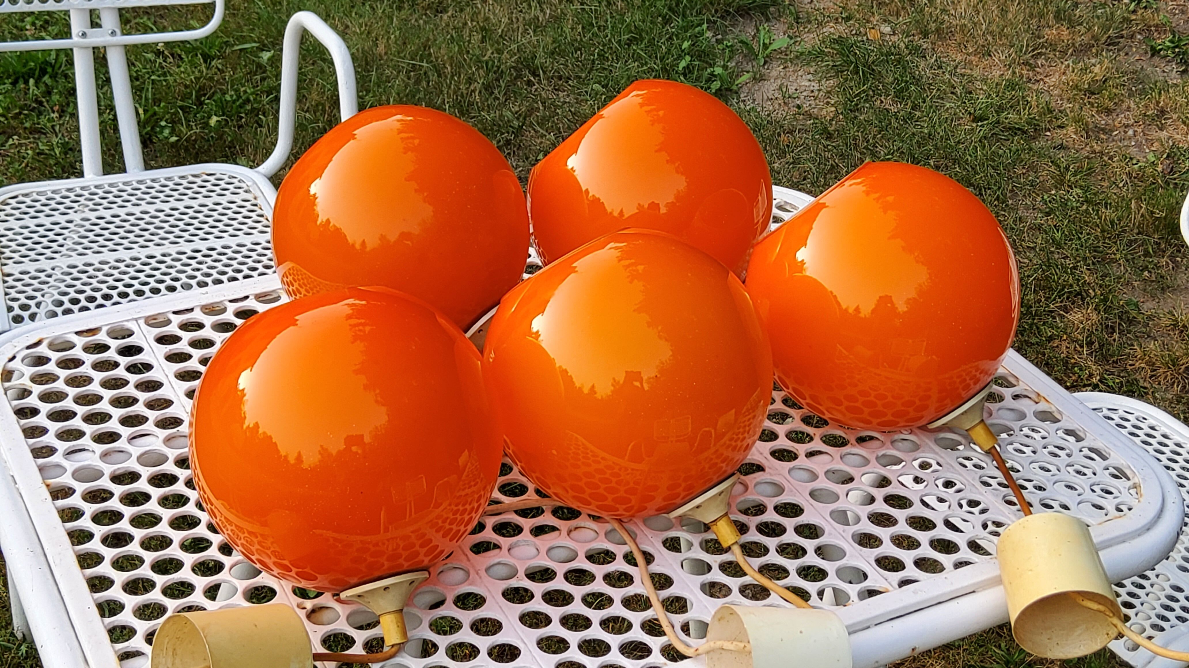 Set of 5 orange glass ball pendants from the 70s