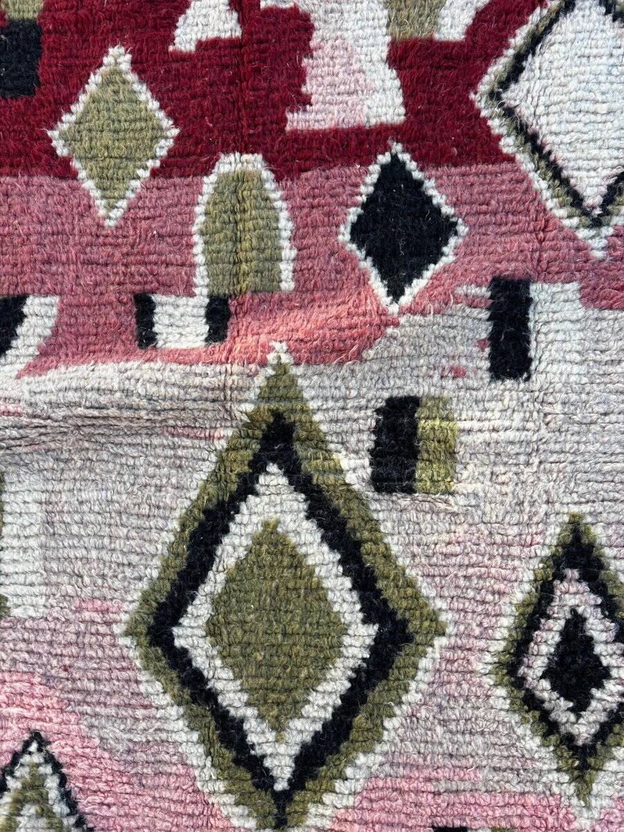 Pink and red Berber Boujad rug in wool, bohemian decor.