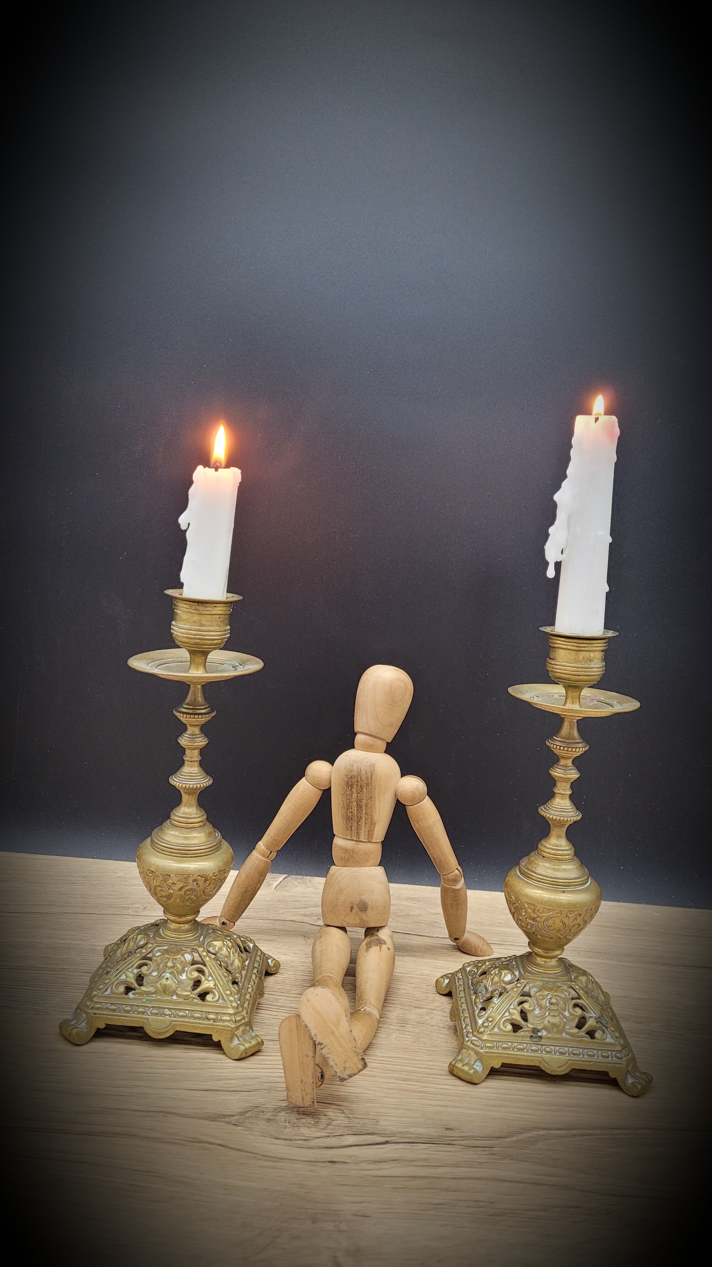 Duo worked brass candle holders