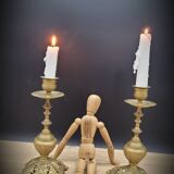 Duo worked brass candle holders