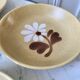 Set of 4 hollow plates in sandstone flowers painted 70s