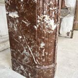 Red marble fireplace in the Louis XVI style, late 19th century