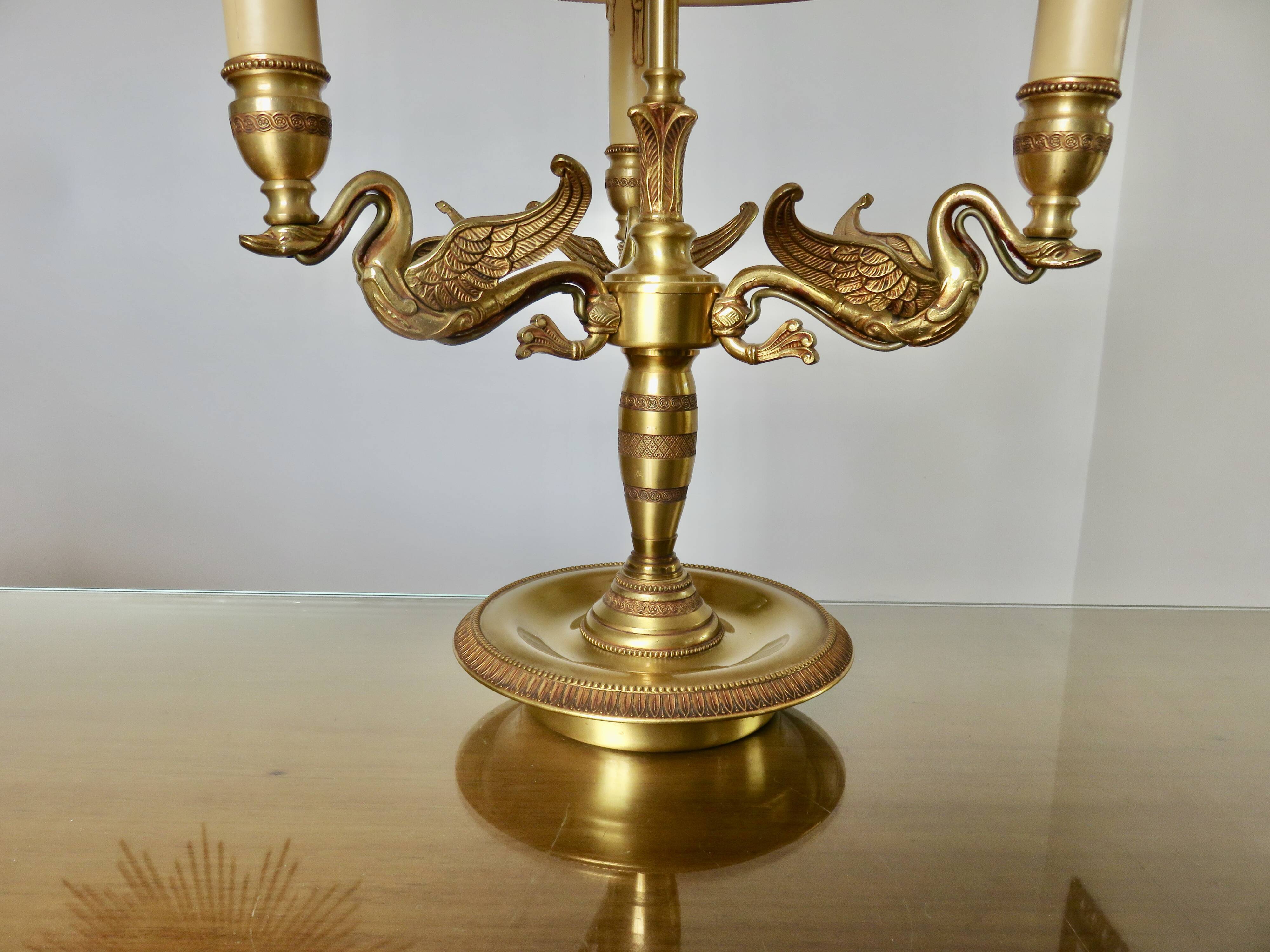 Lucien Gau empire style lamp in solid bronze gilded with bright gold "with swans"