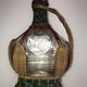 CASTAGNON glass carafe covered with wicker with music box