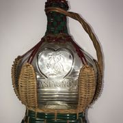Carafe en verre Castagnon recouverte d'osier avec boite à musique