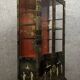 20th century China: Pretty bookcase in lacquer, hard stone and mother-of-pearl with three glazed sides