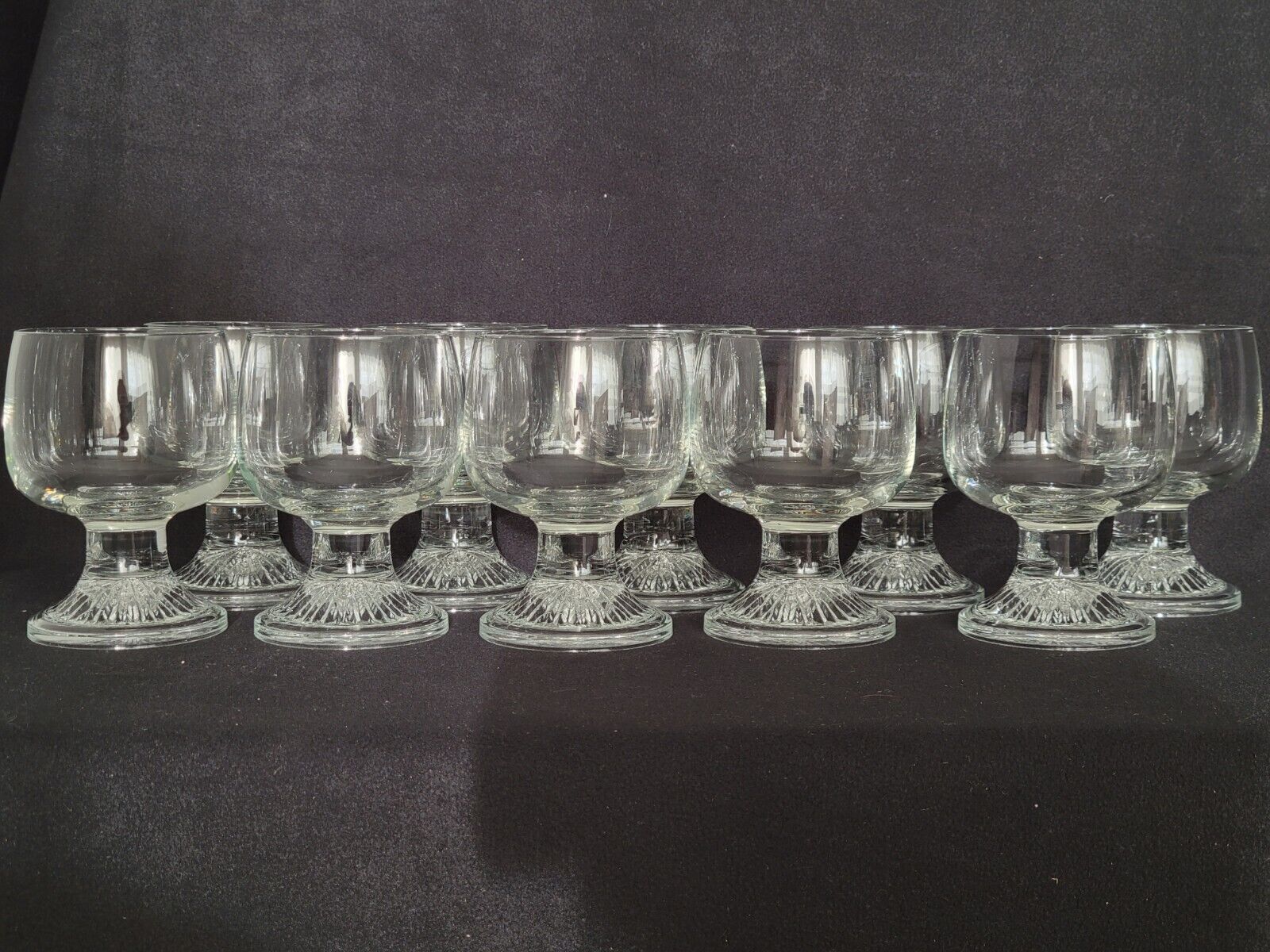 10 vintage stemmed glasses in molded glass