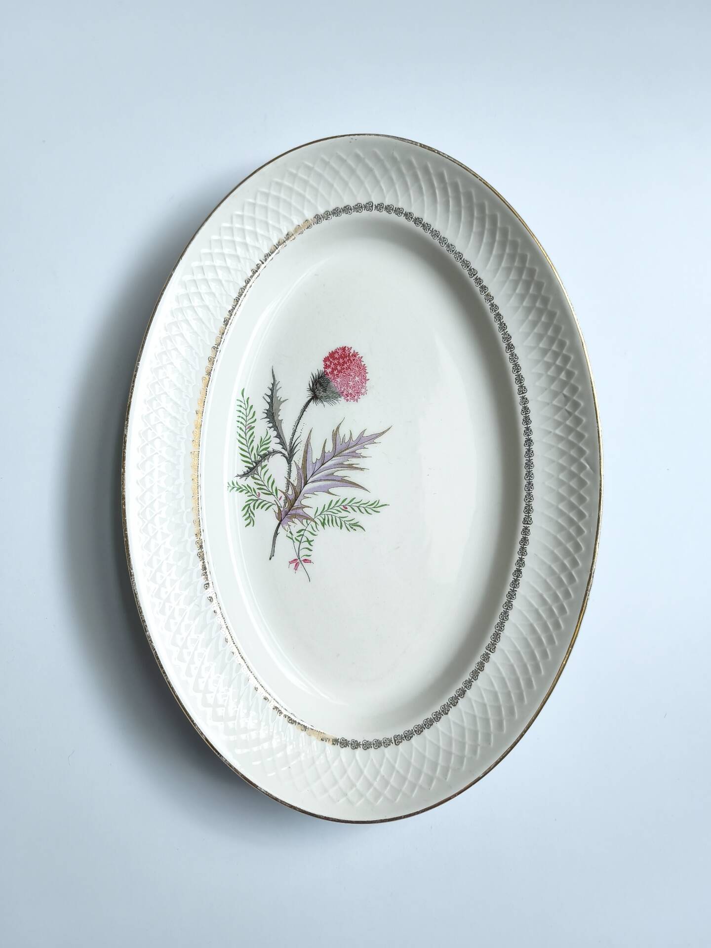 Vintage oval plate signed Moulin des Loups model Imperia pink flower