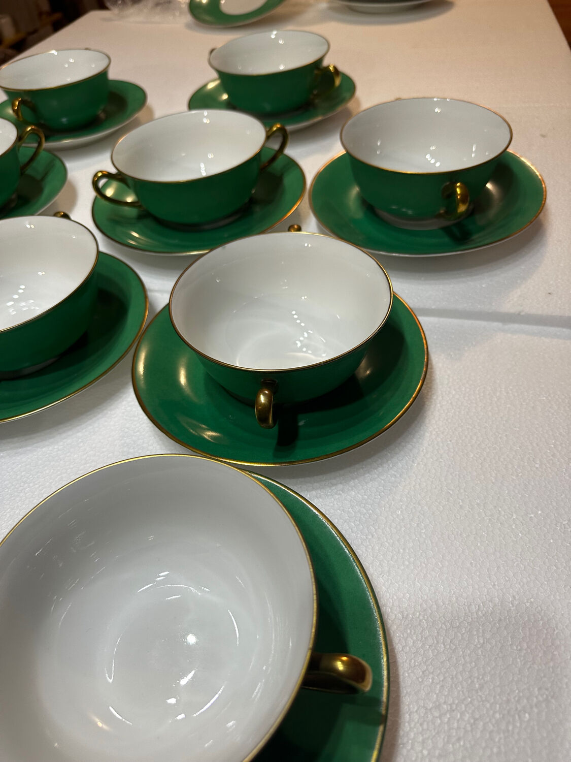 Service 14 cup and saucer in Art Deco Emerald Green and Gold.