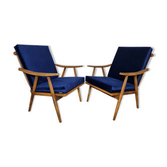 Boomerang" model armchairs by Ton