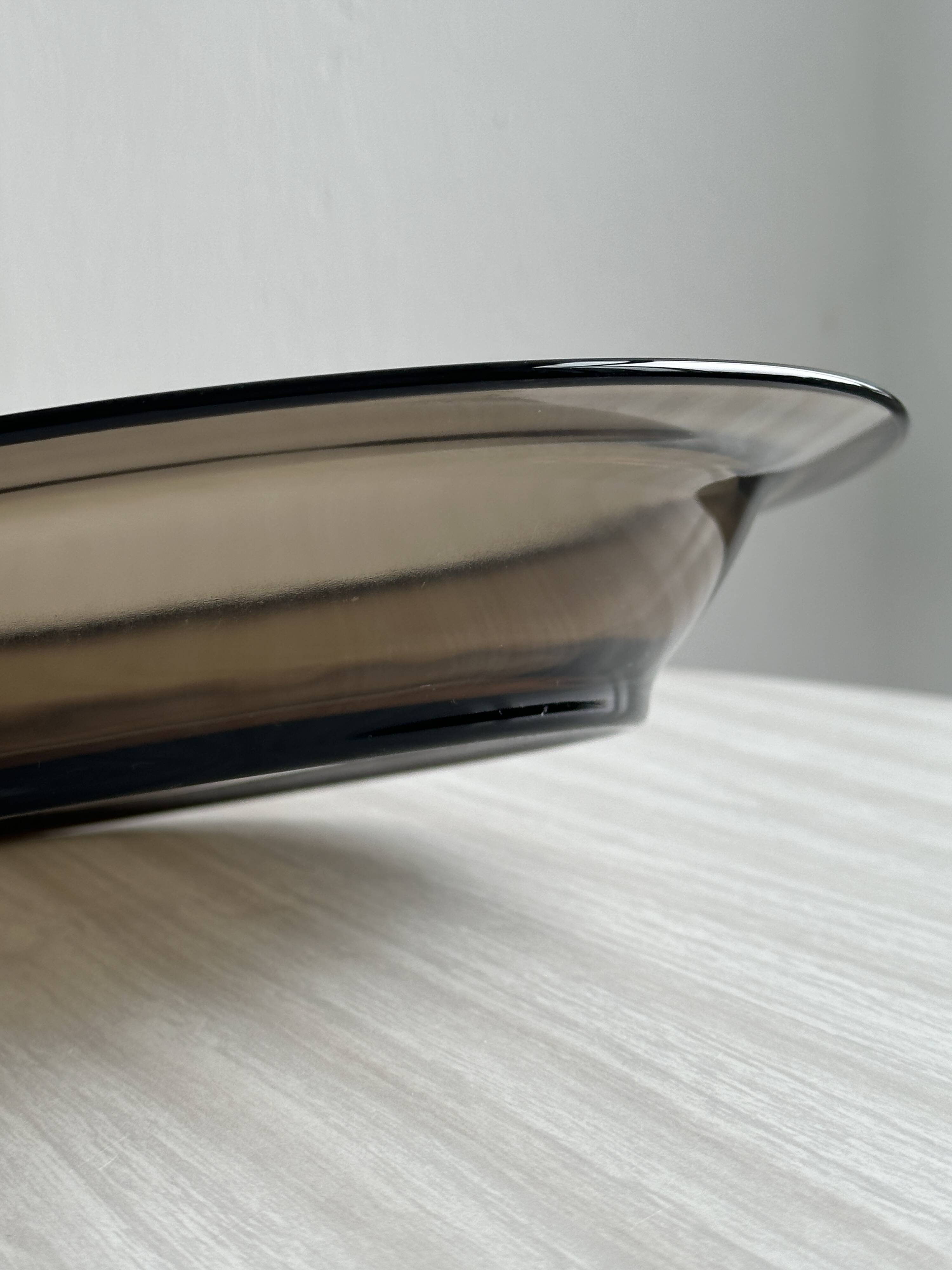Smoked glass dish, modern design.
