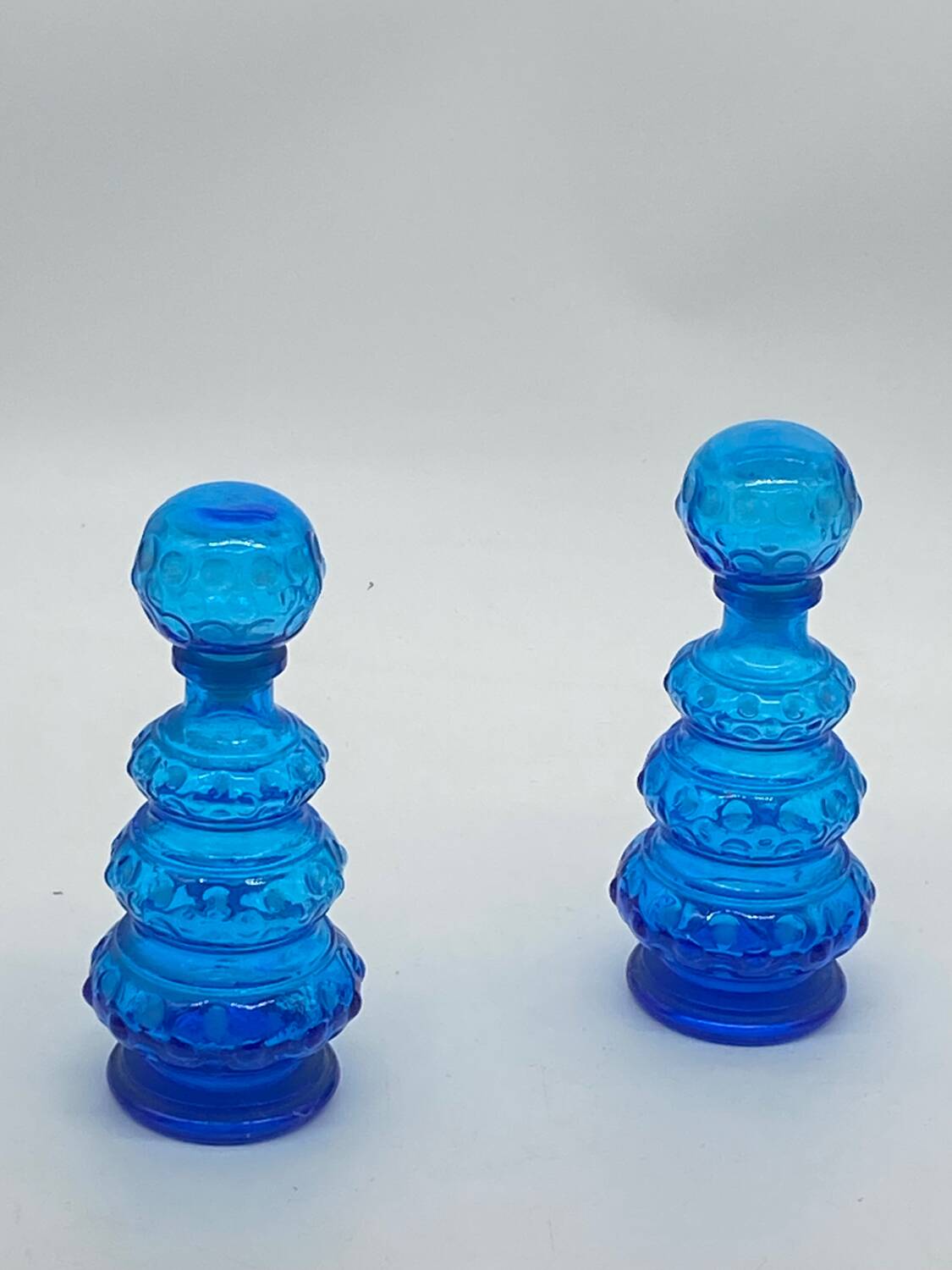 Duo of vintage blue glass bottles / carafe, Empoli, Italy