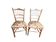 Two floral upholstered music chairs from the early 20th century.