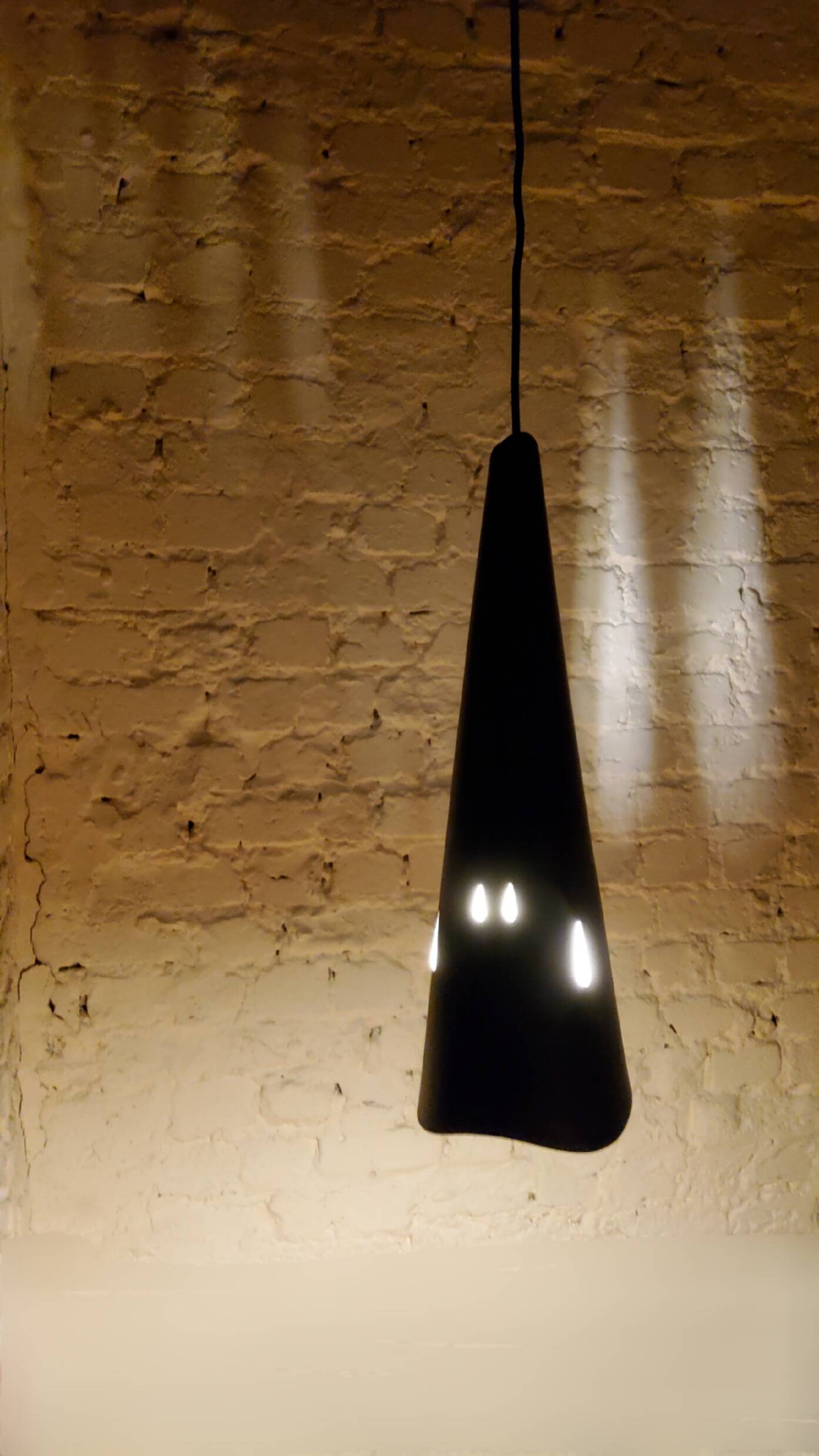 Vintage perforated metal suspensions